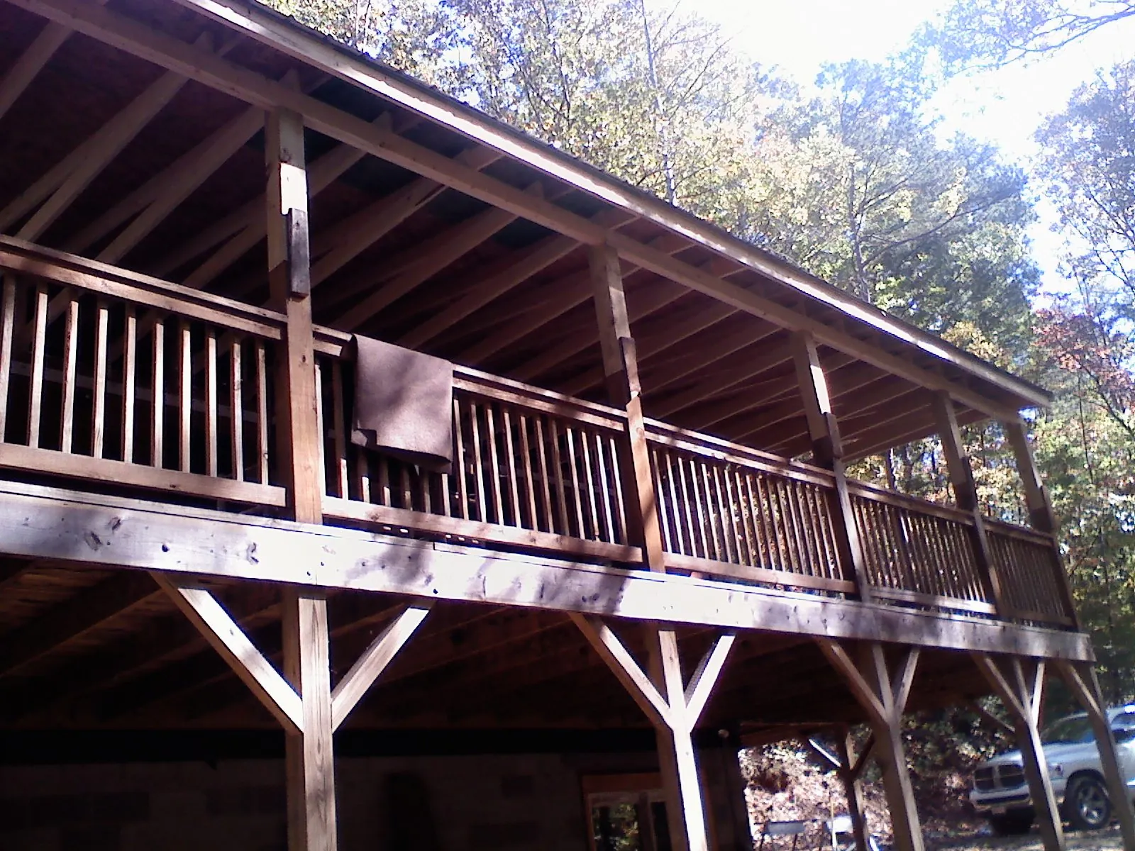 Timber framing under a new elevated porch and deck — Roof Leak Repair in Forest Grove by Roofing Brothers